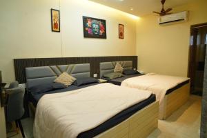 Kumaran Grand - Luxury Rooms