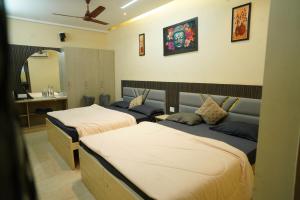 Kumaran Grand - Luxury Rooms