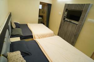 Kumaran Grand - Luxury Rooms