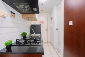 Fancy Studio at Springlake Summarecon Bekasi Apartment By Travelio