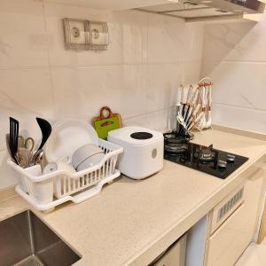 Sky House Apartment BSD with Smart TV 43 inch Near AEONmall, The Breeze, ICE BSD by Nagoya Japandi Style