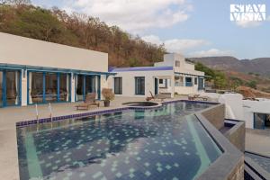 StayVista at Villa Santora with BBQ, Infinity Pool