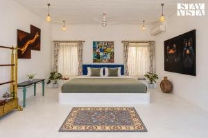 StayVista at Villa Santora with BBQ, Infinity Pool