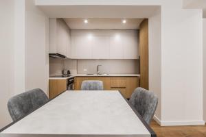 Bright Apartment with Large Terrace & Free Parking by PikHost