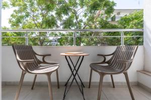 Xenios Suites, Modern City Center Living