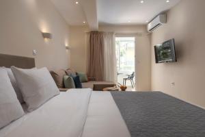 Xenios Suites, Modern City Center Living