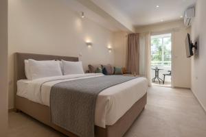 Xenios Suites, Modern City Center Living