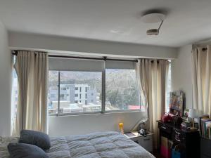 Exclusive, stylish, bright, and perfectly located!
