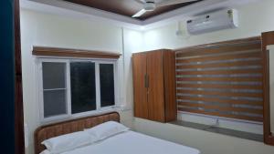 Room in 4-bedroom homestay in Koonammavu