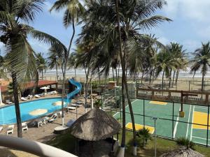 Apartamento en Res Arcoiris, Tucacas, Frente al Mar, Balcon, Piscina y Playa Privada