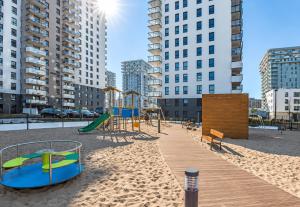 Obrońców Wybrzeża by Downtown Apartments