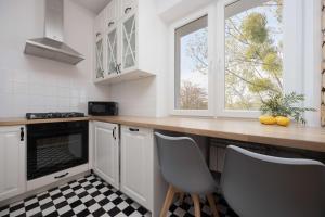 Bright Apartament Młynarska Perfect for Remote Work by Noclegi Renters