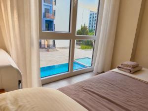 HOLA Collection - Poolside Apartment