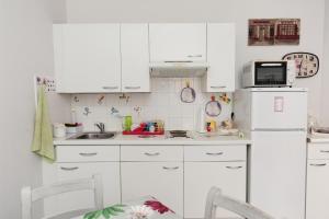 Appartements La Romantica Dante Five stars Holiday House : photos des chambres