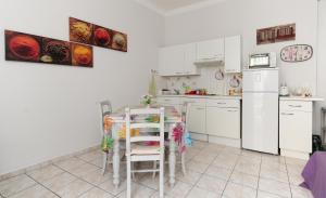 Appartements La Romantica Dante Five stars Holiday House : photos des chambres