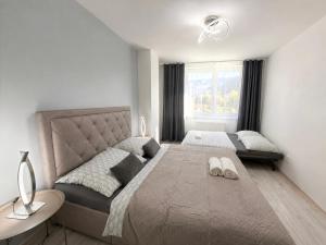 Simcity 3 I Skyline Elegance I 3BR, private parking, sunny terrace with panoramic city view 5min walk to city square