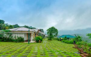 ELIVAAS Signature Junglebrooke 8 Room Pet-Friendly Cottage Estate With Swimming Pool, Forest View, In-House Restaurant & Landscaped Lawn