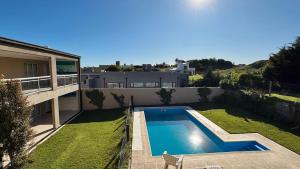 Departamento con Pileta y Parrillas - Condominio el faro