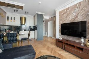 Klimatyzowany Apartament z Dostępem do Tarasu na Dachu w Ciechocinku by Renters Prestige