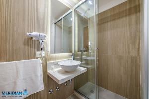 104 Steps from Shopping del Sol with private patio!