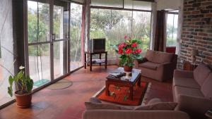 Casa Raíces Refugio de Jardín y Campo