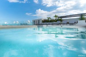 Veranto - 2BR Loft with Rooftop Pool, Gym & Parking