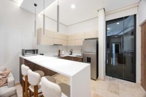 Luxury Suite Steps from the Sea