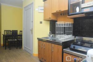 Homey and Nice 2BR at Semanggi Apartment By Travelio