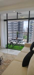classy tastefully furnished executive two bedroom apartment with fully equipped gym ample parking space swimming pool children playing ground and amazing scenic views