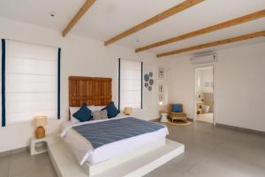 ELIVAAS Prive Casa Santorini Greek-Style 2-BHK Villa with Private Pool, Water Slide, Open Shower, Jacuzzi & Beach Views