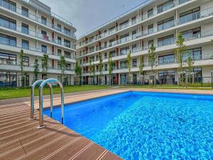 Apartament Wydma 18b z basenem by Holiday Park Apartments, Ku Morzu