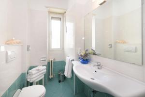 Double Room with Side Sea View room in Hotel La Marina