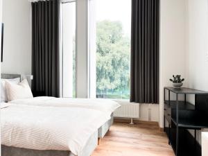 Spacious & Sunny Riverside Apartment in Tartu
