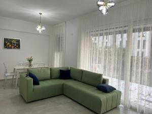 First floor apartment with garden near the beach