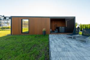 Domki Aurea - nowe stylowe domki z jacuzzi i sauną - 350m od morza, plac zabaw, rowery, grill