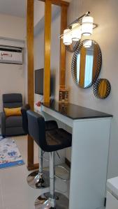 Condo with free swimming pool and court