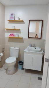 Condo with free swimming pool and court