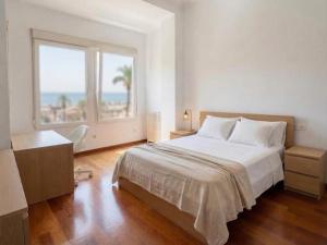 Postiguet Beach, sea views, and Santa Bárbara Castle