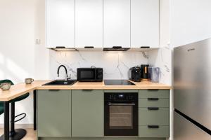 Scarpa Gdańsk Apartment with Private Parking & Balcony
