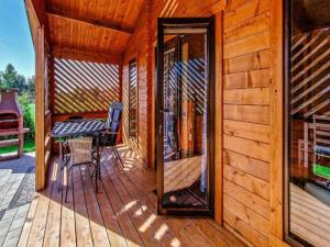Holiday homes with terraces, sauna whirlpool