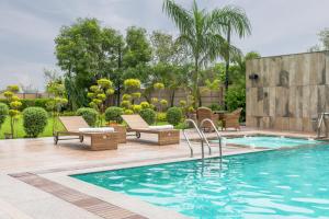 Bargoti Villa by ELIVAAS Signature Luxurious 5-BHK Hillside Retreat with Private Pool, Pool Deck, Sprawling Garden & Outdoor Lounge
