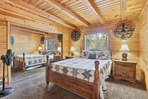 Real log cabin in the Pines with large game room!