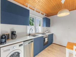 Comfortable holiday home with a fireplace