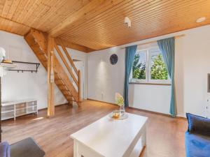 Comfortable holiday home with a fireplace