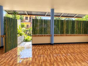 2BR Tropical Gated Home with WiFi and Kitchen Close to Tourist Spots