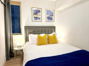 Prince Rupert Suites: Modern 1BR Kitchen & Laundry