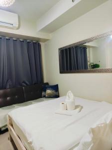 Premium Staycation in Shell residence MOA - JD