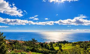 Coastal Serenity Ground Floor Ocean Views with Private Parking in Calheta