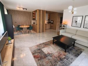 Apartament nadmorski z ogródkiem