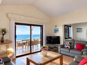 Riptide Luxury sea front villa with a heated pool free